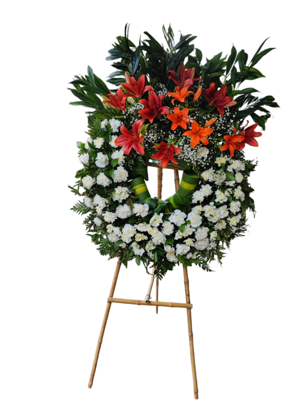 Corona Fúnebre de Margaritas y Lirios Naranjas