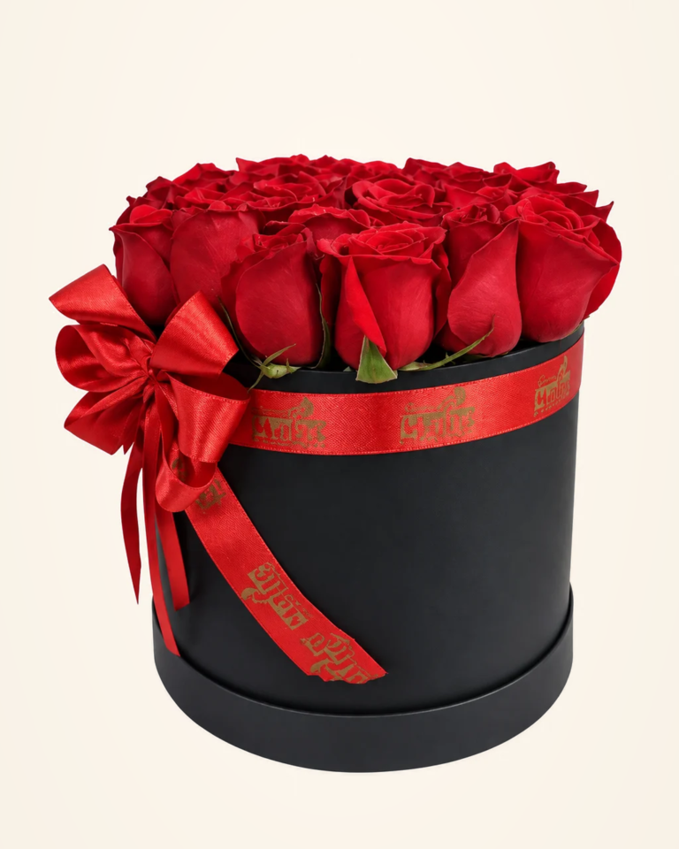 Cilindro de rosas rojas